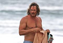 Jason Lewis shirtless on beach