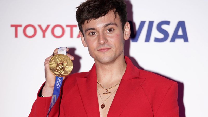 Tom Daley’s new outfit – platform shoes and red suit for 2021 Team GB Ball