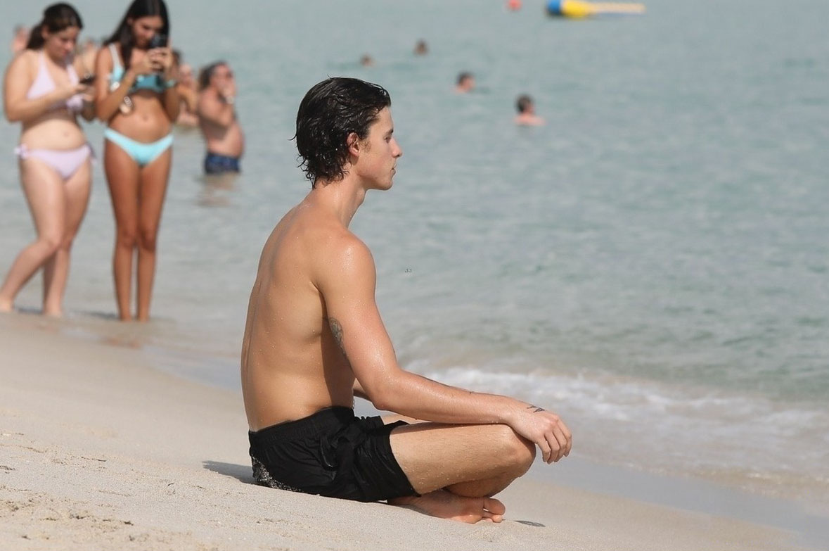 Hot pics of Shawn Mendes meditating on the beach