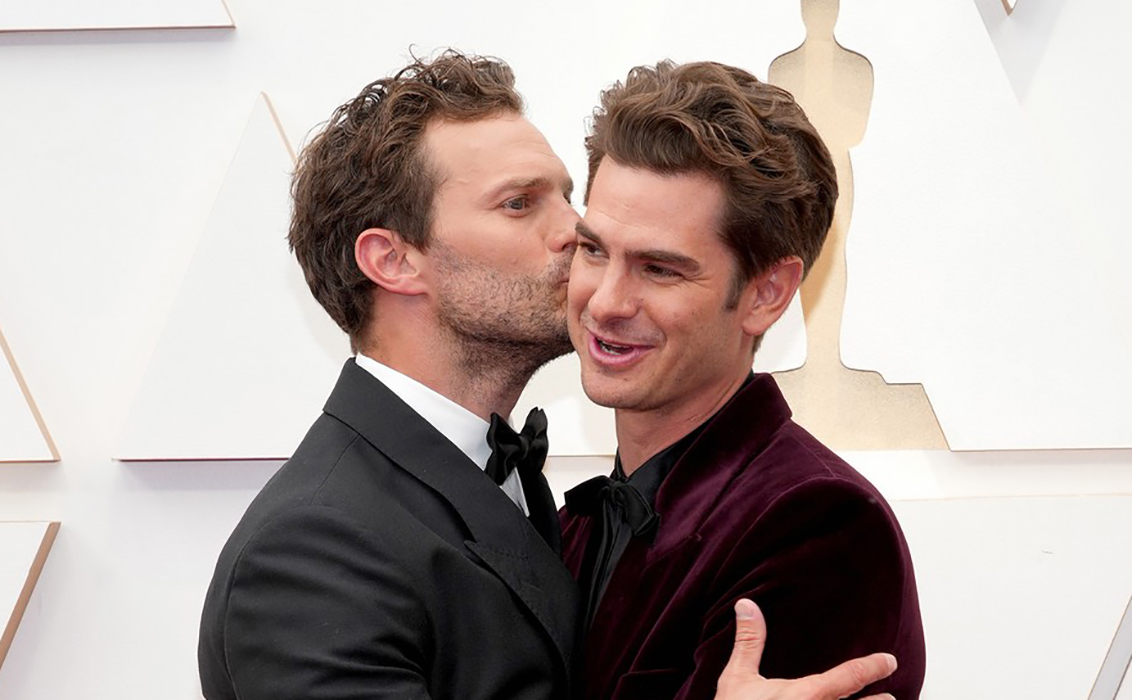 Gentle kisses of Jamie Dornan and Andrew Garfield at the Oscars