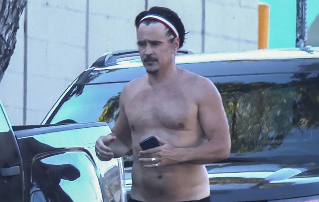 Colin Farrell spotted shirtless while walking