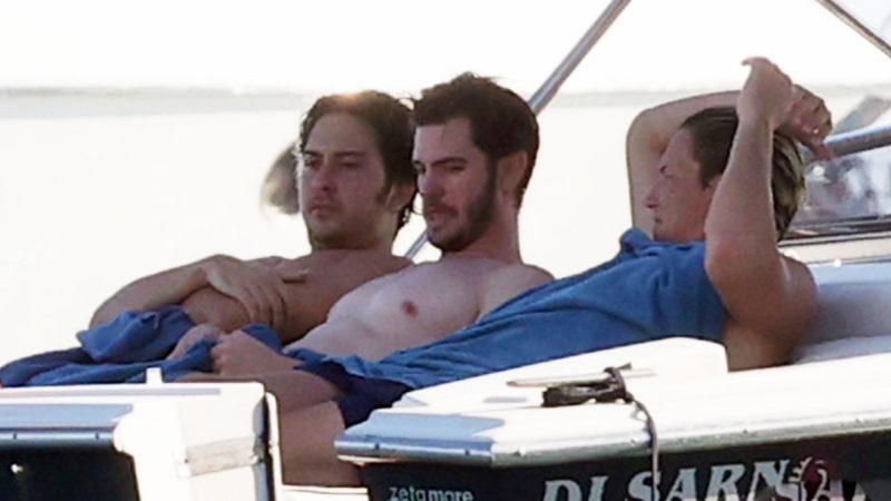 Andrew Garfield fools around in the water during his vacation