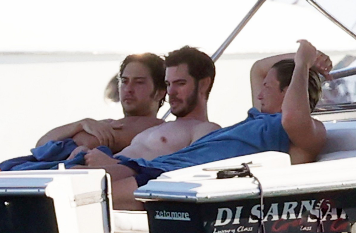 Andrew Garfield fools around in the water during his vacation