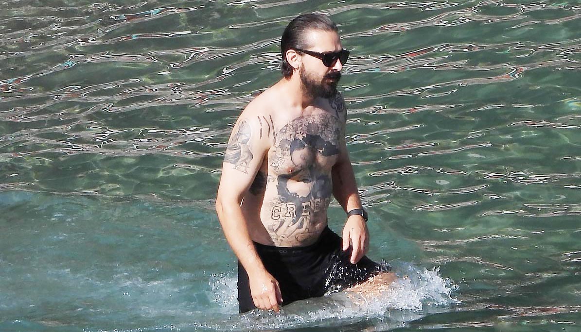 Shia LaBeouf shows off her tattooed chest in Italy