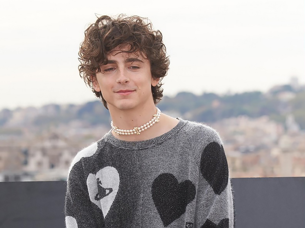 Timothee Chalamet poses for a photoshoot in Italy