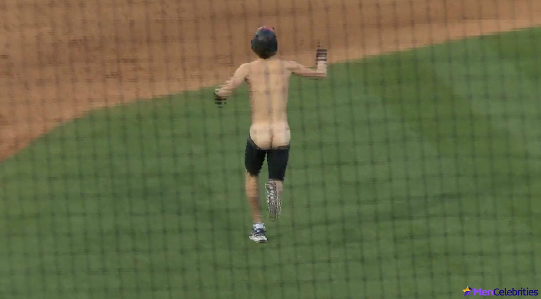 Streaker shocks audience with his naked bum during baseball game