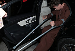 Will Poulter with crutches