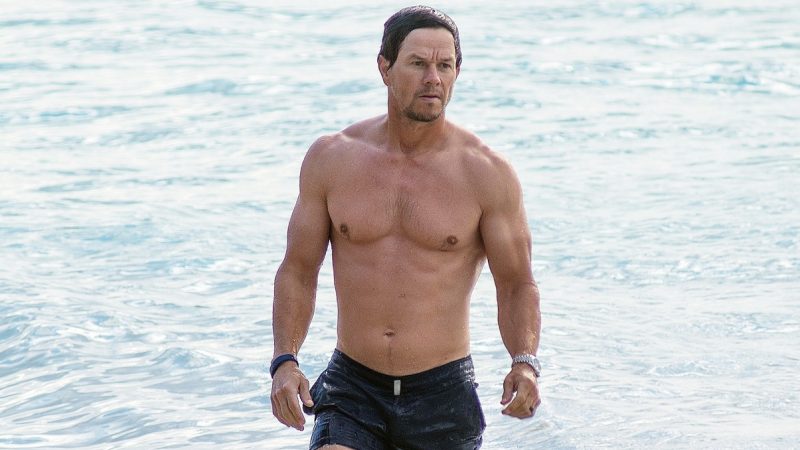 Mark Wahlberg appears without a shirt on the beach