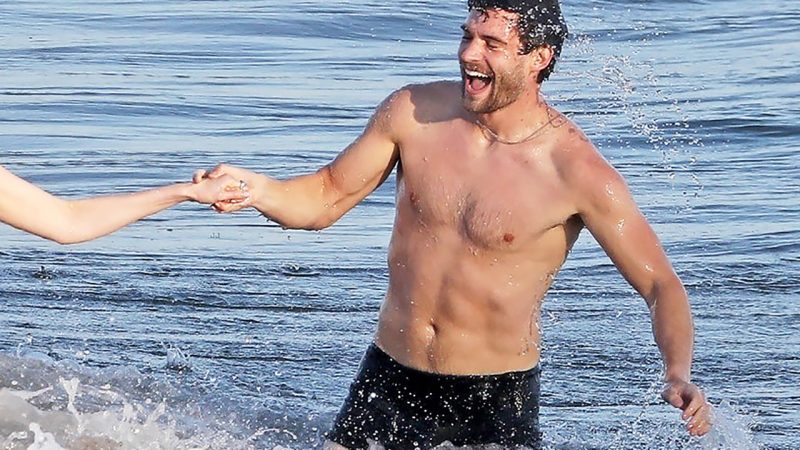 David Corenswet shows off his naked torso in beach scenes