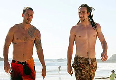 Taylor Kitsch shirtless on beach