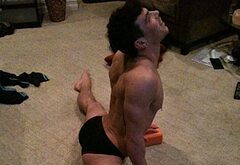 Joe Jonas shirtless on a beach