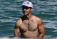 Joe Jonas shirtless on a beach