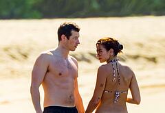 Callum Turner shirtless on beach