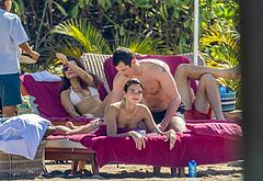 Callum Turner shirtless on beach