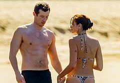 Callum Turner shirtless on beach